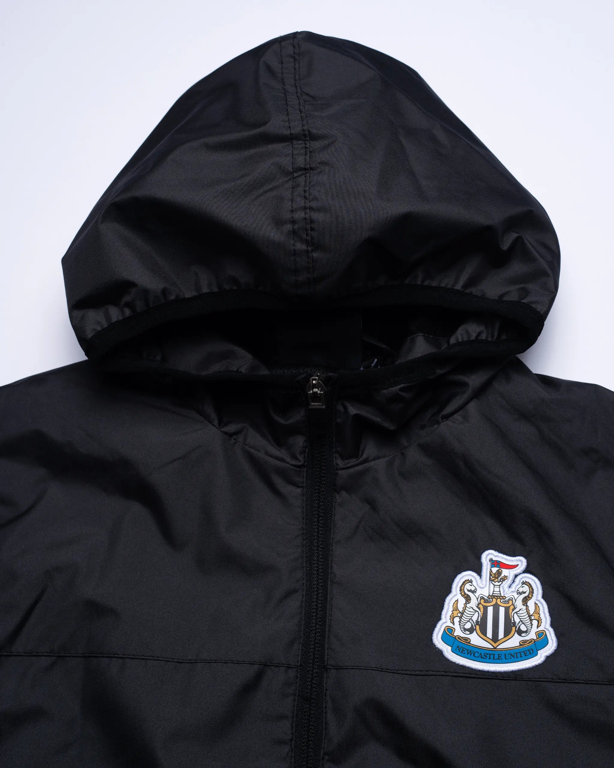 Newcastle United Girl's Black Terrace Shower Jacket